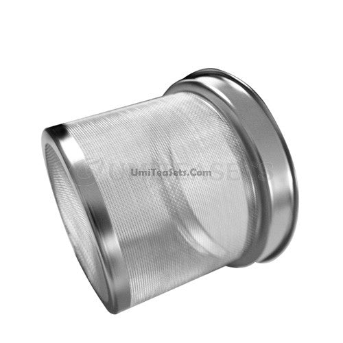 Close-up of the ergonomic handle of the stainless steel teapot for comfortable pouring.
