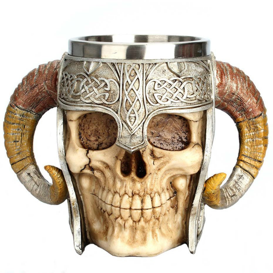 Close-up of stainless steel skull mug with detailed design